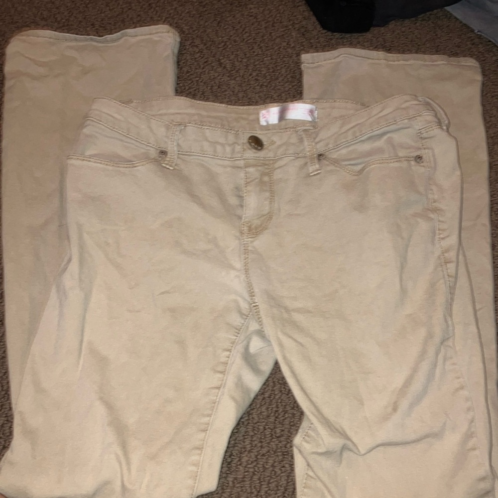 Low/mid rise tan flared pants